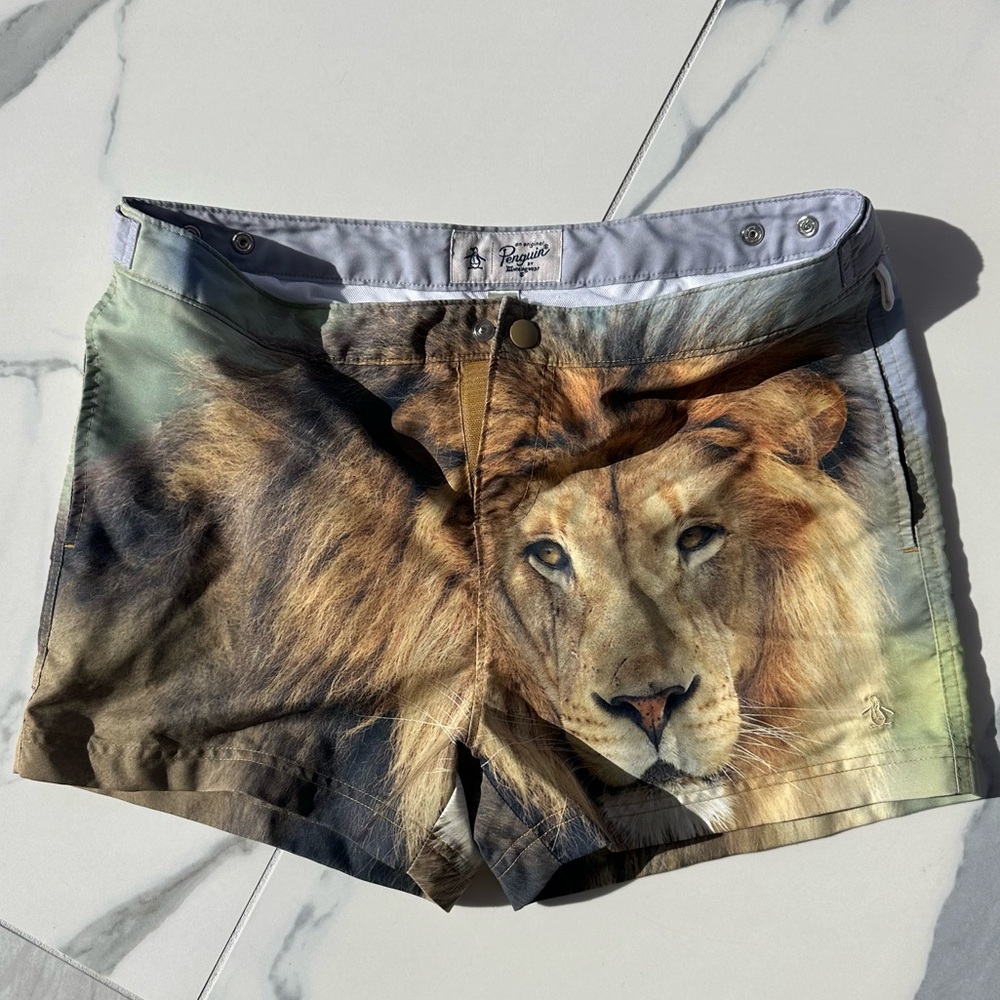 Worn Once Men's Original Penguin lion print swim trunks